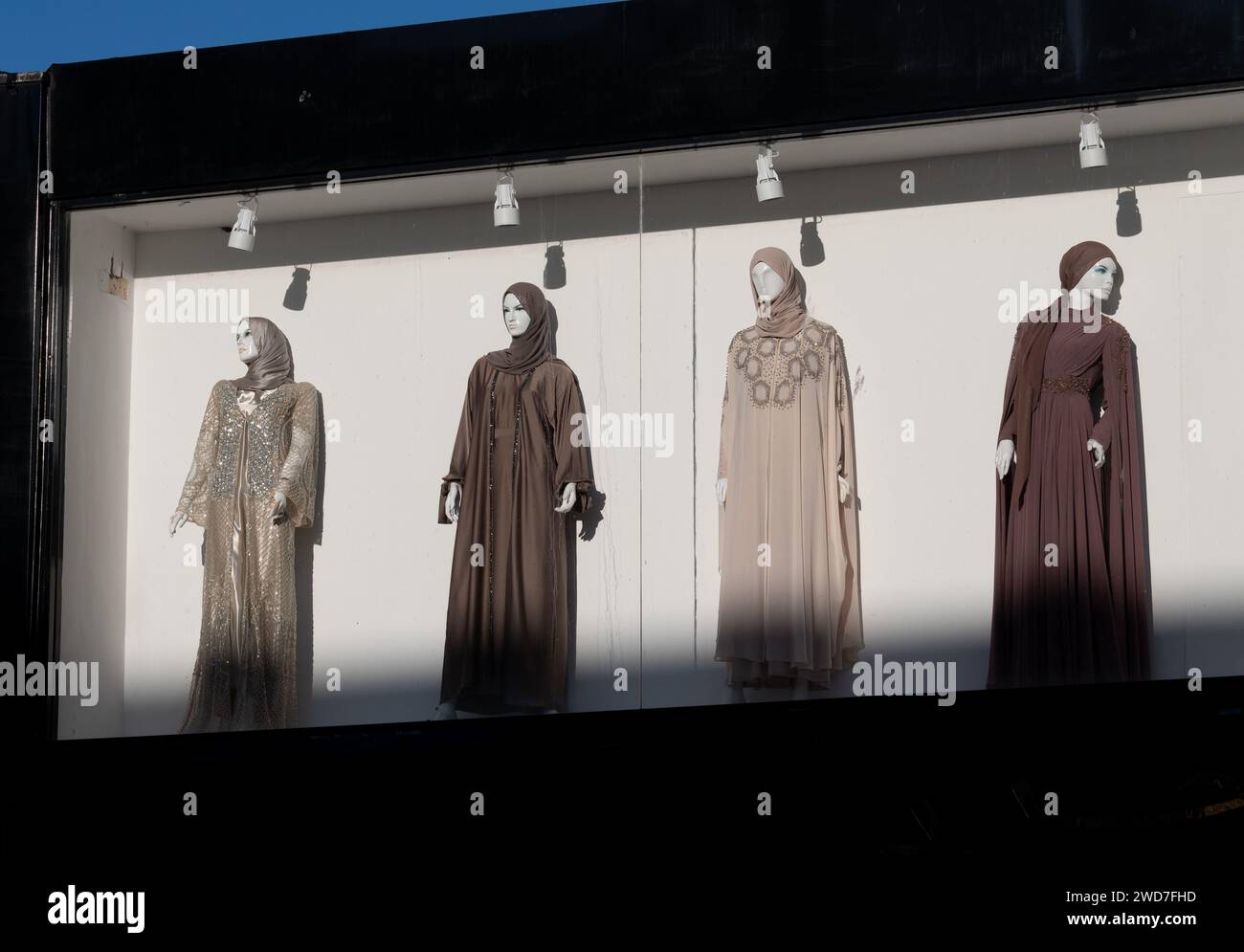 Muslim women`s clothing in a shop window, Coventry Road, Small Heath, Birmingham, UK Stock Photo